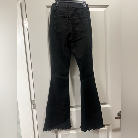 Black Flare jeans with holes at the knees - Picture 1 of 4